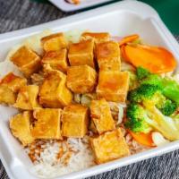 Tofu Vegetarian Teriyaki · Served with mixed vegetables and white rice.