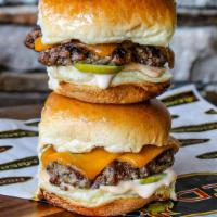 Steakburger With Cheese Sliders · Cheddar, housemade 1000 island, pickle.