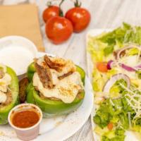 Beef Gyro Stuffed Bell Peppers Keto / Low Carb · Roasted Bell peppers with beef gyro served with salad, Avocado, parmesan cheese and Keto sau...