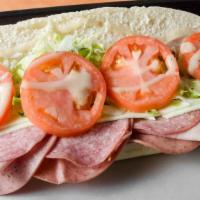 Tubby’S Famous (Large) · This popular sub is made with cotto salami, hard salami, and ham. 430-860 cal.