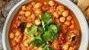 Channa Masala · Vegan. A delicious variety of chickpeas, onions, and tomatoes cooked in rich onion sauce wit...