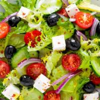 Greek Salad · Field Greens, tomatoes, cucumbers, onions, feta cheese & Kalamata olives