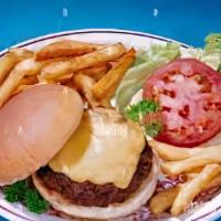 Cheeseburger Deluxe · With French fries can soda