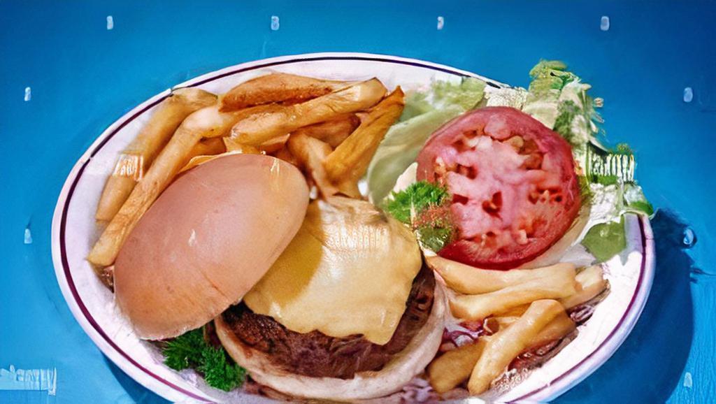 Cheeseburger Deluxe · With French fries can soda