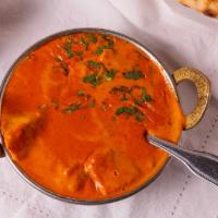 Chicken Tikka Masala · Chicken breast tenders in marinated in spices and yogurt, baked in tandoor oven and cooked i...