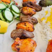 Bakhtiari Kabob · Combination of Boneless Chicken and Shish Kabob, served with white rice, grilled tomato and ...