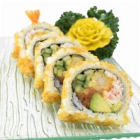 Dragon Roll · Shrimp tempura, spicy tuna, crab salad, cucumber, avocado, and tempura flakes