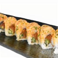 Lucky Roll · Cucumber and spicy tuna, Topped with a mix of crab salad, scallops, cilantro tobico and spic...