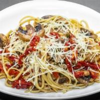 Linguine Pietro · Vegetarian. Linguine tossed with mushrooms, sun-dried tomatoes, garlic and capers in olive o...