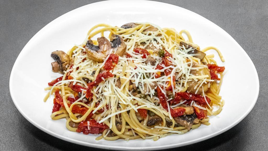 Linguine Pietro · Vegetarian. Linguine tossed with mushrooms, sun-dried tomatoes, garlic and capers in olive oil and white wine.