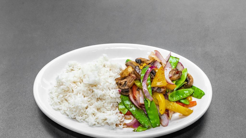 Thai Stir Fry · Vegetarian. Stir fried peppers, onions, mushrooms, snow peas, and spicy Thai chili sauce served over gourmet rice.