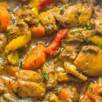 Curry Chicken Dinner · comes with cabbage and rice and peas and plantain
