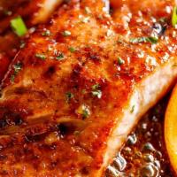Salmon Dinner & 2 Sides · honey jerk glazed salmon cooked to perfection
