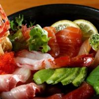 Chirashi Entrée · Assorted fresh raw fish served on a bed of flavored sushi rice.
