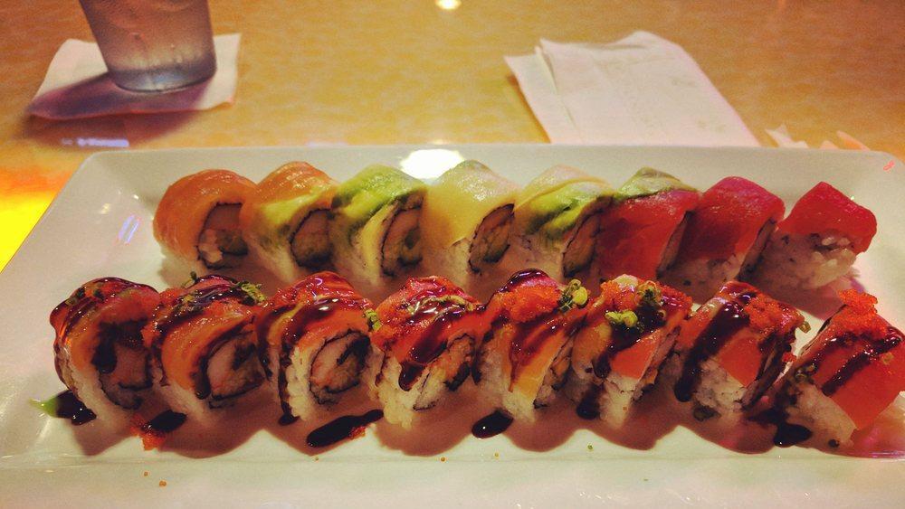 Rainbow Roll · Avocado & crabmeat inside, topped with assorted raw fish. Raw fish.