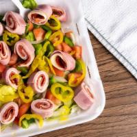 Antipasto Salad · Tossed Salad with Ham, genoa salami, pepperoni, Provolone cheese and hot banana peppers with...