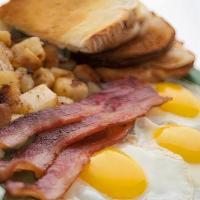 Bacon & Eggs Breakfast · Two eggs any style served with two strips of bacon, one pancake, and home fries.