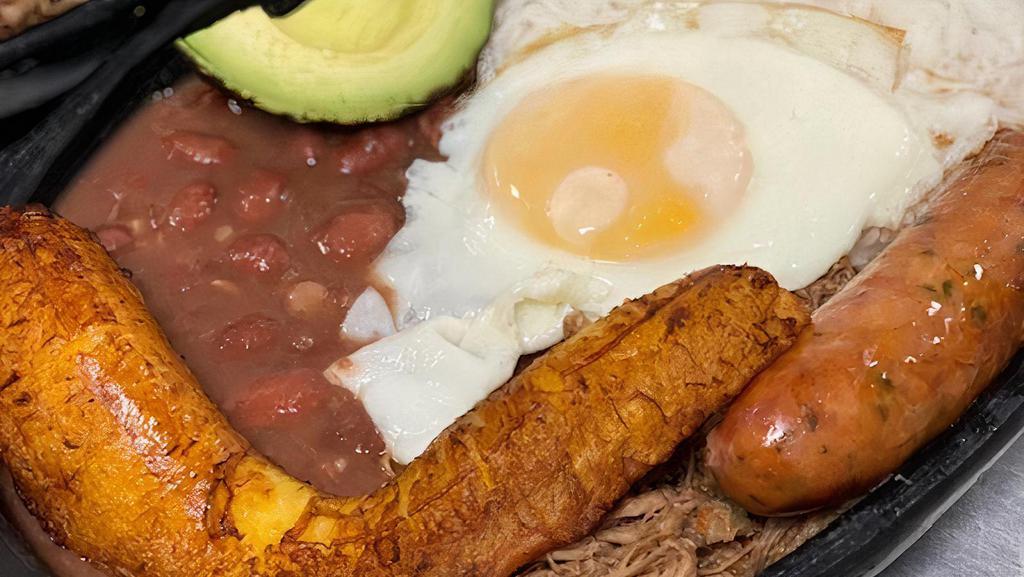 Bandeja Paisa · patter w/ grd. beef, beans, chicharron, arepa, plantains, egg, avocado, rice.