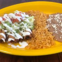 Flautas · 4 rolled corn tortillas filled with chicken & deep fried.  Topped with lettuce, sour cream, ...