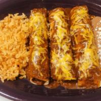 3 Enchilada Plate · chicken , beef , or cheese  enchiladas topped with your choice of sauce.  Served with rice a...