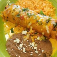 Chimichanga · Fried flour tortilla stuffed with your choice of meat & cheese.  Served with rice, beans & s...