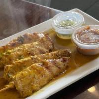 Satay · Choice of chicken or tofu marinated in Thai herbs, spices, and grilled on skewers. Served wi...