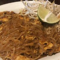Pad Thai · Stir fried rice noodles with eggs, bean sprouts, green and red onions with a choice of meat ...