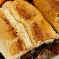 Philly Cheese Steak · Grilled steak or grilled chicken, white cheese, grilled onions, grilled green peppers, mayo.