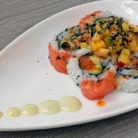 Salmon Lover Roll · Salmon And Avocado Topped With Salmon, Tempura Bits And Mango Tobiko Sauce