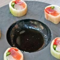 Sashimi Roll · Tuna, Salmon, White Fish, Fish Roe And Asparagus Wrapped In Sweet Chili Sauce And Tempura Bits