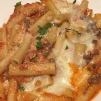 Baked Ziti Bolognese · Baked ziti pasta with marinara sauce rigotta meat sauce topped with mozzarella then baked in...