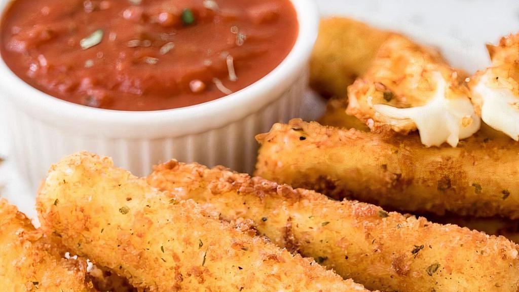 Mozzarella Sticks · Breaded mozzarella sticks are deep-fried to golden perfection in minutes! They're melted and gooey on the inside but remain nice and crispy on the outside!
