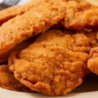 Chicken Tenders · White meat chicken tenders golden brown. Served with choice of sauce.
