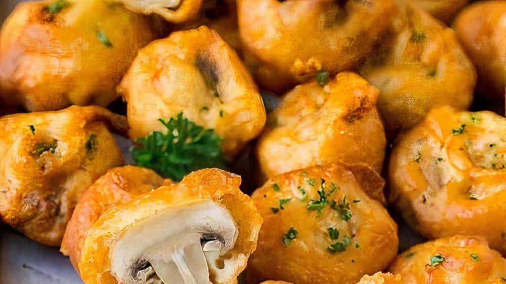 Fried Mushrooms (15Pcs) · These fried mushrooms are coated in a light and crispy seasoned beer batter, then deep-fried to golden brown perfection. The ultimate party snack that’s always a huge hit!