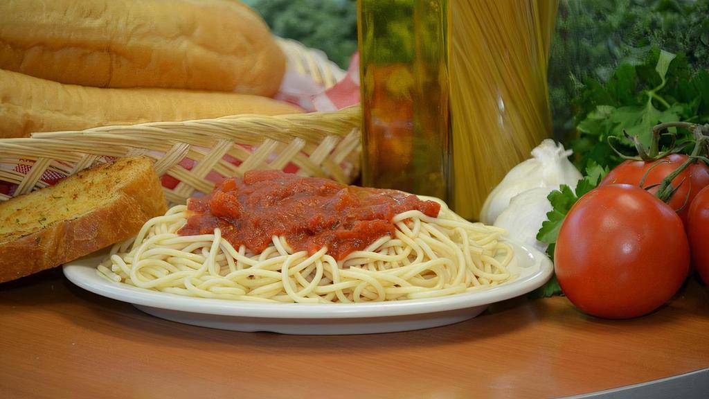 Spaghetti With Marinara Sauce · Classic spaghetti served with mouth-watering marinara sauce. Served with garlic. bread.