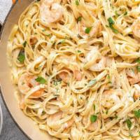 Shrimp Fettuccine Alfredo · Fulfilling Fettuccine pasta with sea fresh shrimp in a creamy Alfredo sauce and a. layer of ...