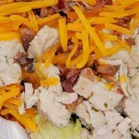 Chicken Bacon Ranch Salad · Fresh mixed green lettuce, red onions, ripe tomatoes, grilled chicken breast, cucumbers, bac...