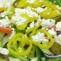 Greek Salad · A delightful blend of fresh mixed greens topped with red onions, black olives, tomatoes, jal...