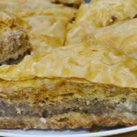 Baklava Dessert · Flaky layered filo pastry, filled with finely chopped nuts, drenched with honey syrup and to...