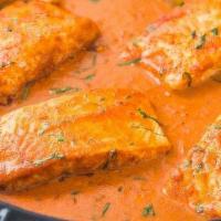 Salmon Fish Curry · Fresh chunks of Salman fish cooked in onion-based curry sauce. Salmon Fish Curry, an Indian-...