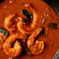 Shrimp Curry · Shrimp cooked with tomatoes, ginger, garlic, and onion. Prepared in an authentic sauce, spic...