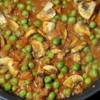 Mattar Mushrooms (Green Pea & Mushroom) · Fresh mushrooms and green peas cooked in an onion-based curry sauce. this dish is Vegan and ...