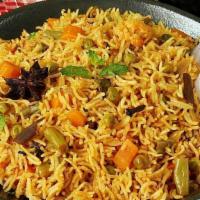 Vegetable Biryani · Biryani is a delicious dish served in and around India. These dishes are made by cooking bas...