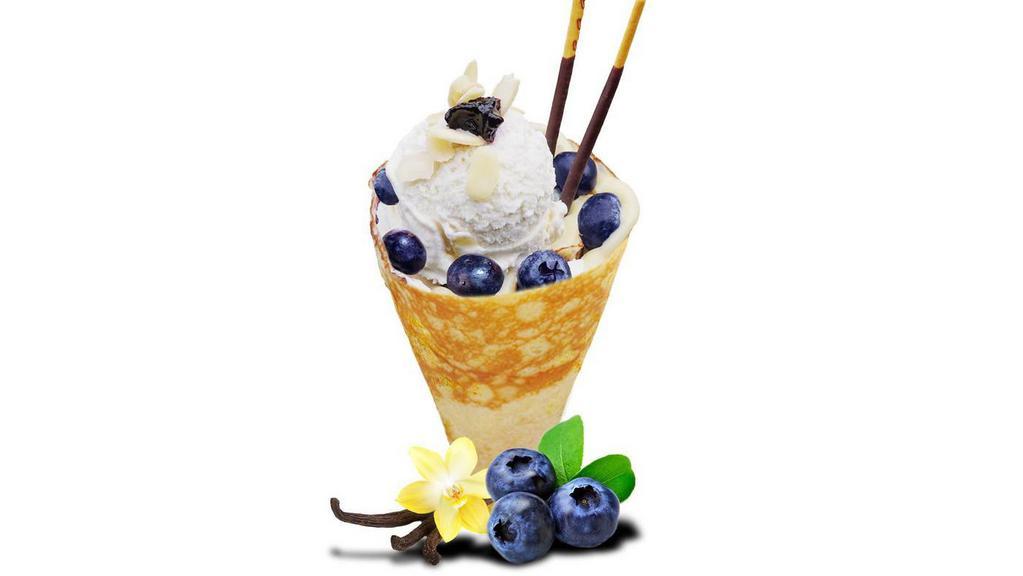Cheesecake Delight · Included - soft crepes, blueberry, almond, blueberry jam, whipped cream cheese, custard cream, pocky sticks, whipped yogurt, vanilla ice cream