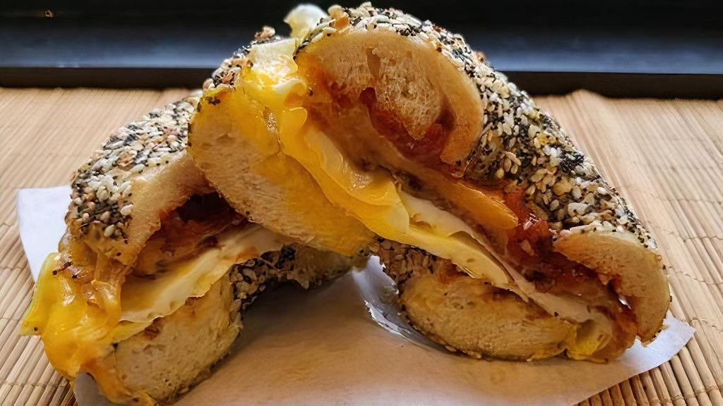 Rose'N Shine Breakfast Sandwich · Breakfast, served on a bagel of your choice! Comes with egg, your choice of protein, cheese, and Sunrise sauce.