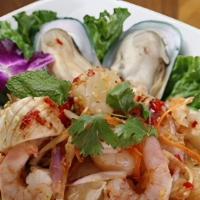 Thai Gulf Seafood Cold Salad (ยำทะเล) · Assorted seafood mixed with onion, scallions, tomatoes and chili tossed in lime dressing