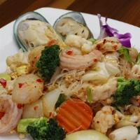 Suki Yaki (Seafood) · Glass noodles with assorted seafood ( shrimp, mussel, calamari, scallops and fish), tofu, eg...