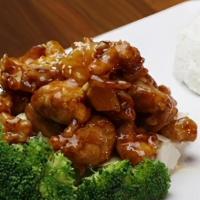 Orange Chicken · Deep fried dice chicken with Thai sweet orange sauce, sesame seeds and served with jasmine r...