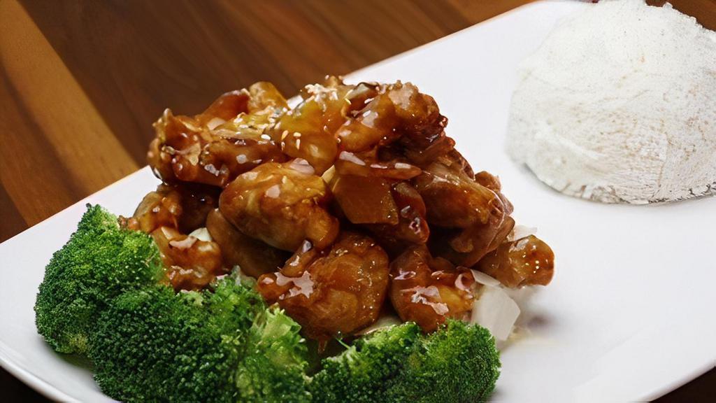 Orange Chicken · Deep fried dice chicken with Thai sweet orange sauce, sesame seeds and served with jasmine rice.