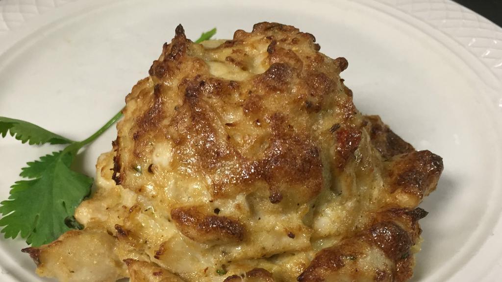 Og'S Famous Jumbo Lump Crab Cake Sandwich · Our huge (10 oz) crab cake made with jumbo lump crab meat and mixed with our secret recipe.